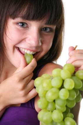 Student enjoying fresh grapes